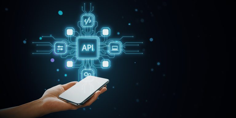 person-holding-phone-with-holographic-api-icons-connecting-symbols-dark-blue-background-concept-online-technology-network