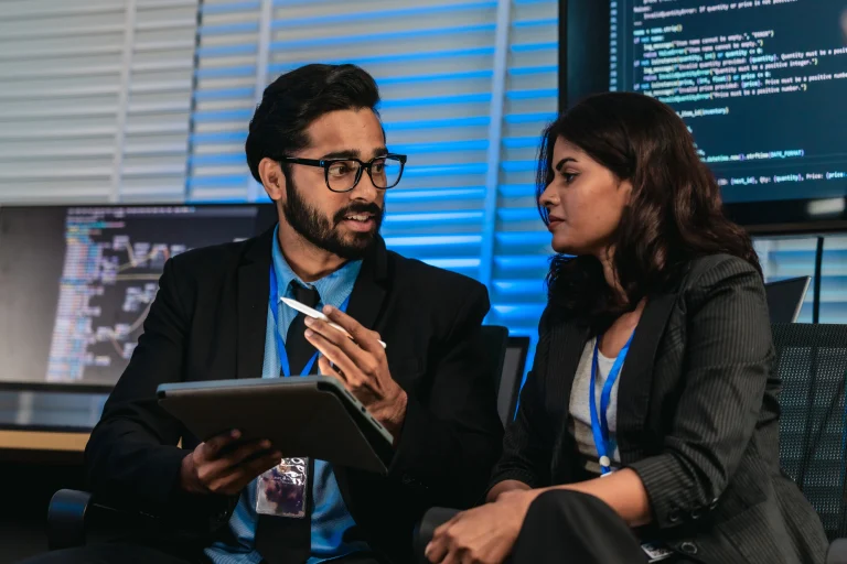 software-developers-discussing-code